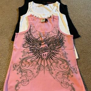 3 shirts 30$. Black xlg white 1w pink 2x